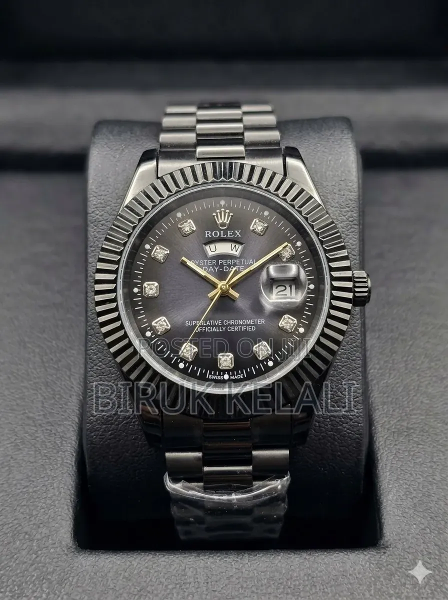 Black Stainless Steel Rolex Day-Date Wristwatch With a Fluted Bezel