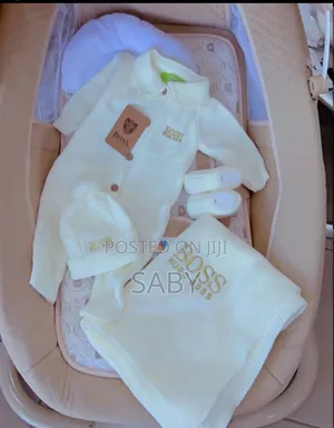 Gucci Cream-Colored Baby Clothes