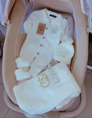 Gucci Cream-Colored Baby Clothes