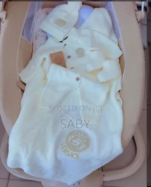 Gucci Cream-Colored Baby Clothes
