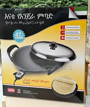 የእጀራ ምጣድ Injera Mitad, Which Is an Electric Griddle Designed For