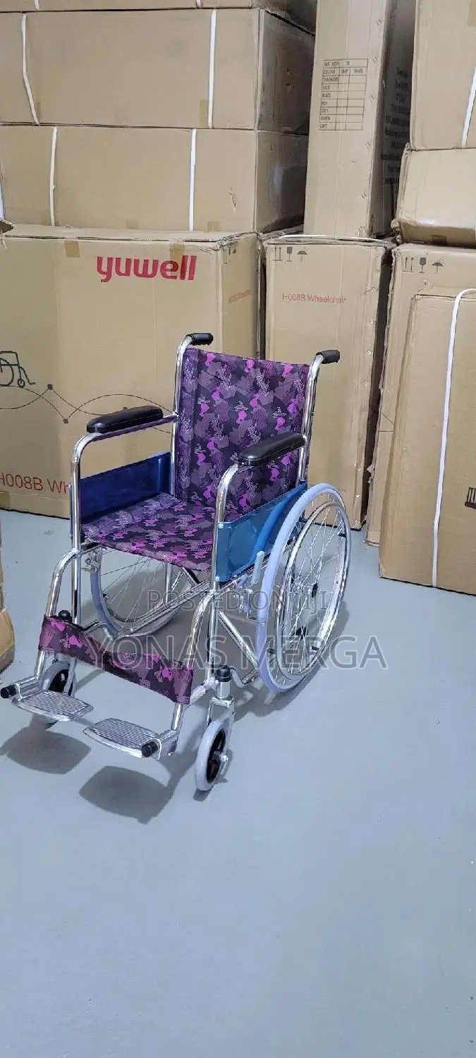 Baby/Children Wheelchair駄脅featuring a Chrome Frame Purple Patterned