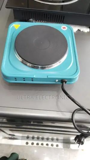 Electric Hot Plate Featuring a Vibrant Blue Carbon Steel Body a 1000w