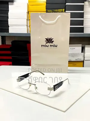 Miu Miu Rimless Sunglasses