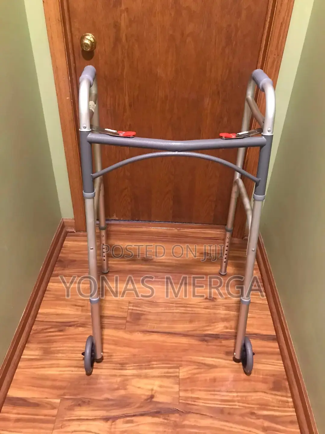 Durable Folding Walker With 2 Wheels by McKesson. It Boasts An