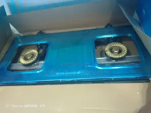 Gas Stove Zhonyi Brand Packaged in a Blue Box Featuring the Slogan