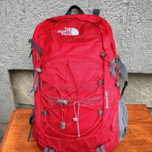 The North Face Red Backpack With Rain Cover