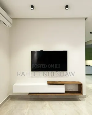 White With Brown Tv Stand