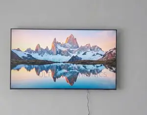 Samsung Qled 65 Inch Tv Displaying a Vibrant Scene of Bioluminescent