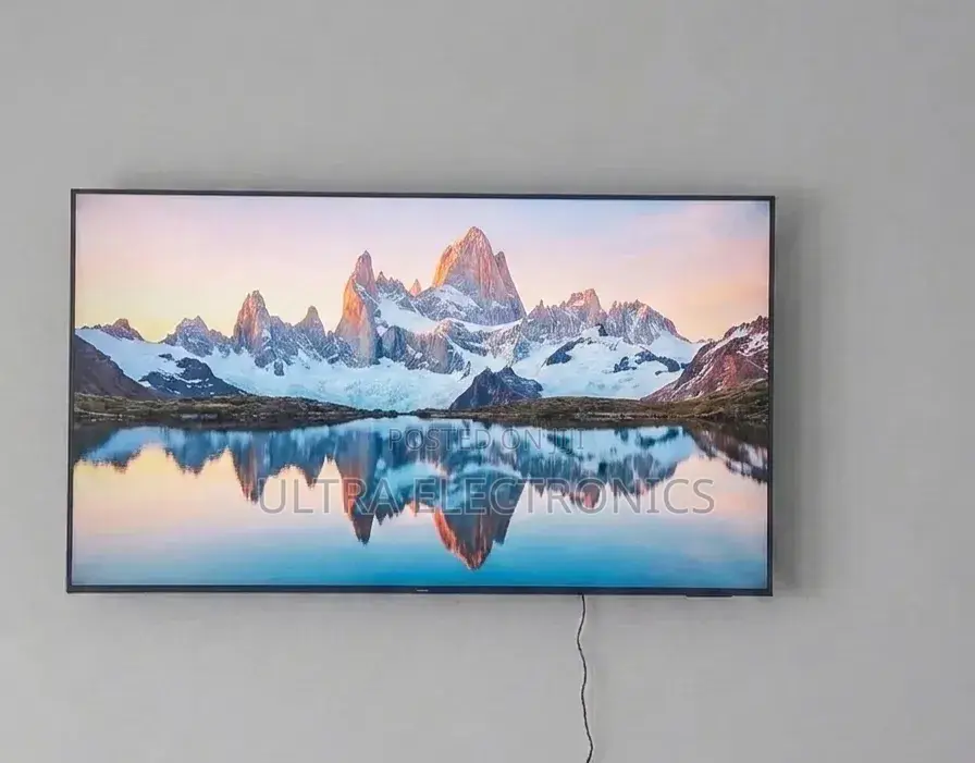 Samsung Qled 65 Inch Tv Displaying a Vibrant Scene of Bioluminescent