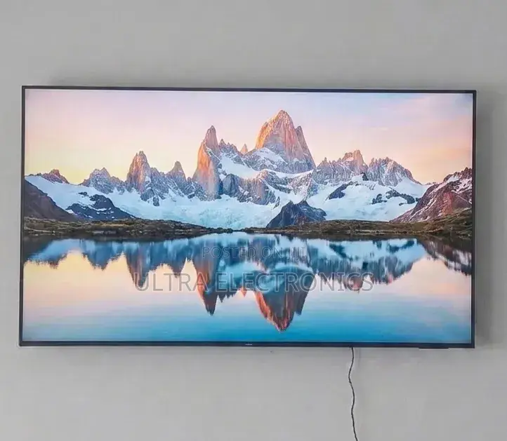 Samsung Qled 65 Inch Tv Displaying a Vibrant Scene of Bioluminescent