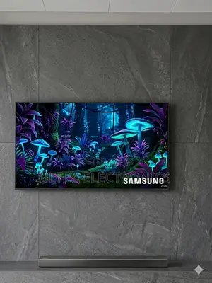 Samsung Qled 65 Inch Television Mounted on a Textured, Grey Stone