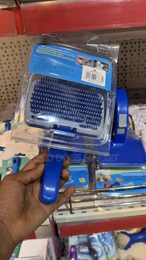 Press Grooming Comb