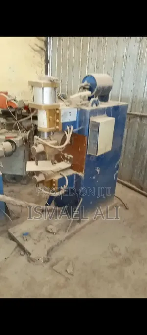 Vertical, Semi-Automatic Resistance Seam Welding Machine