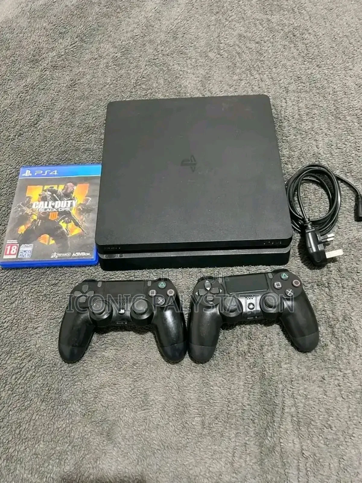 Iconic Playstation 4 Slim With Fifa 26 Game Installed