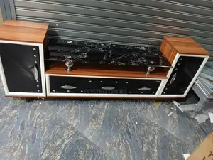 Tv Stand Features A Striking Black Marble-patterned Glass Top