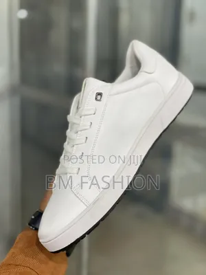 White Lacoste Low-Top: Timeless Court Style