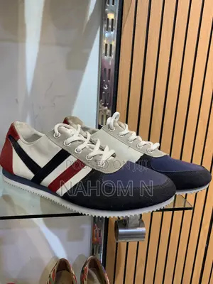 Adidas Astrastar Trainers Feature A Beige Mesh Upper With Bla