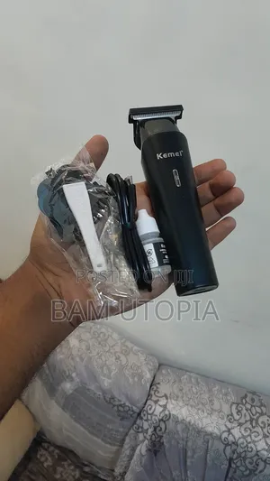 Kemei የፀጉር ማስተካከያ