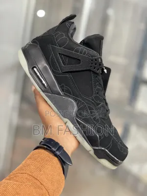 Kaws X Air Jordan 4: All Black