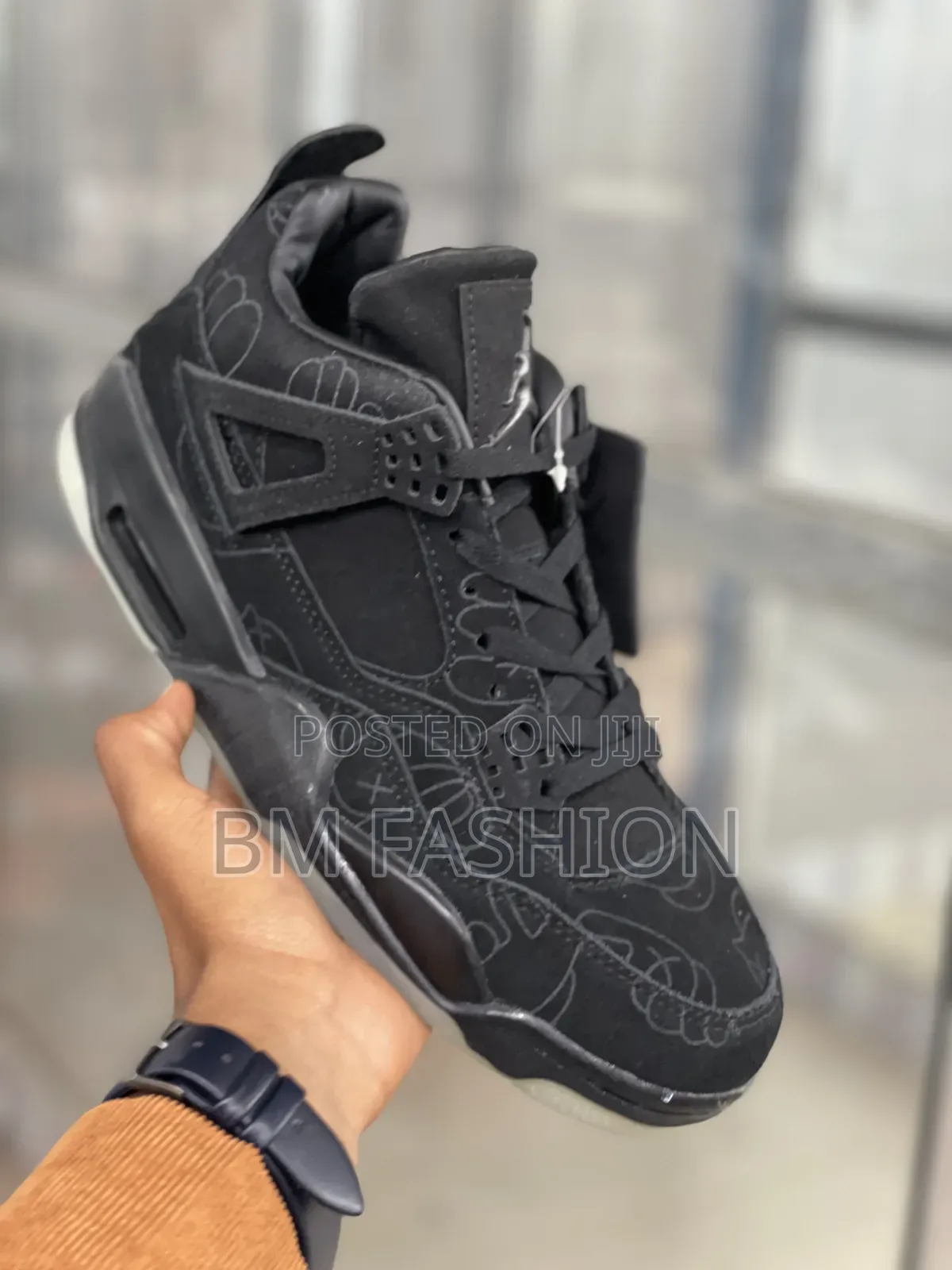 Kaws X Air Jordan 4: All Black