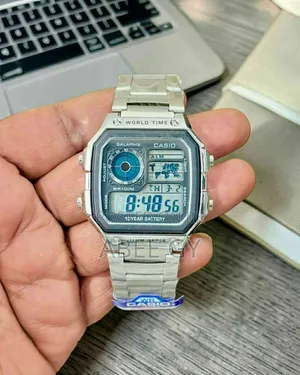 Casio *Features:-* • Digital Display: Shows Time, Date, and Day.