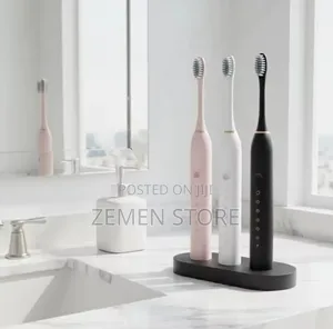 Sonic Electric Toothbrush With 4 Replacement Heads የጥርስ መፋቂያ