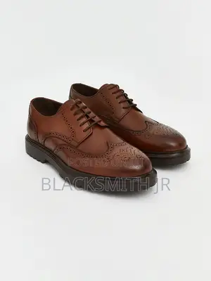 Emeri Mens Leather Wingtip Oxfords