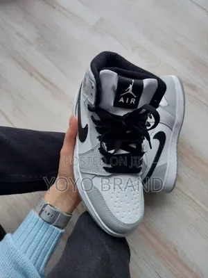 Nike Air Jordan 1 Mid Sneakers Light Smoke Grey, White, and Black
