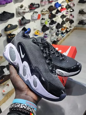 Nike Nocta Glide Sneakers in a Black /White