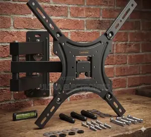 Tv Wall Mount Bracket Displayed on a Wooden Surface Against