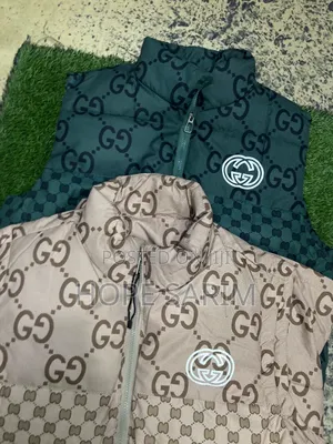 Gucci Monogram Puffer Vests: