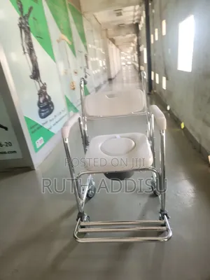 Portable Commode Wheelchair Designed for Elderly Individuals, Post