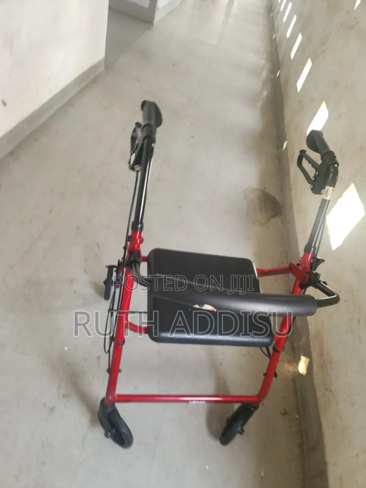Red Drive Medical Aluminum Rollator Featuring Four Wheels, a Padded