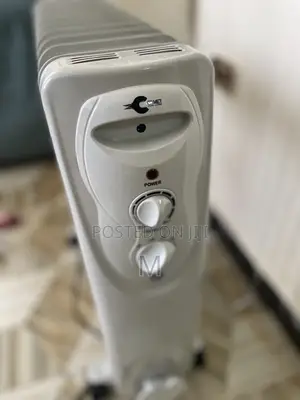 Comet Home Living Oil-Filled Radiator Room Heater (የቤት ማሞቂያ)
