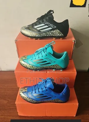 Kids Football Shoes,ታኬታ