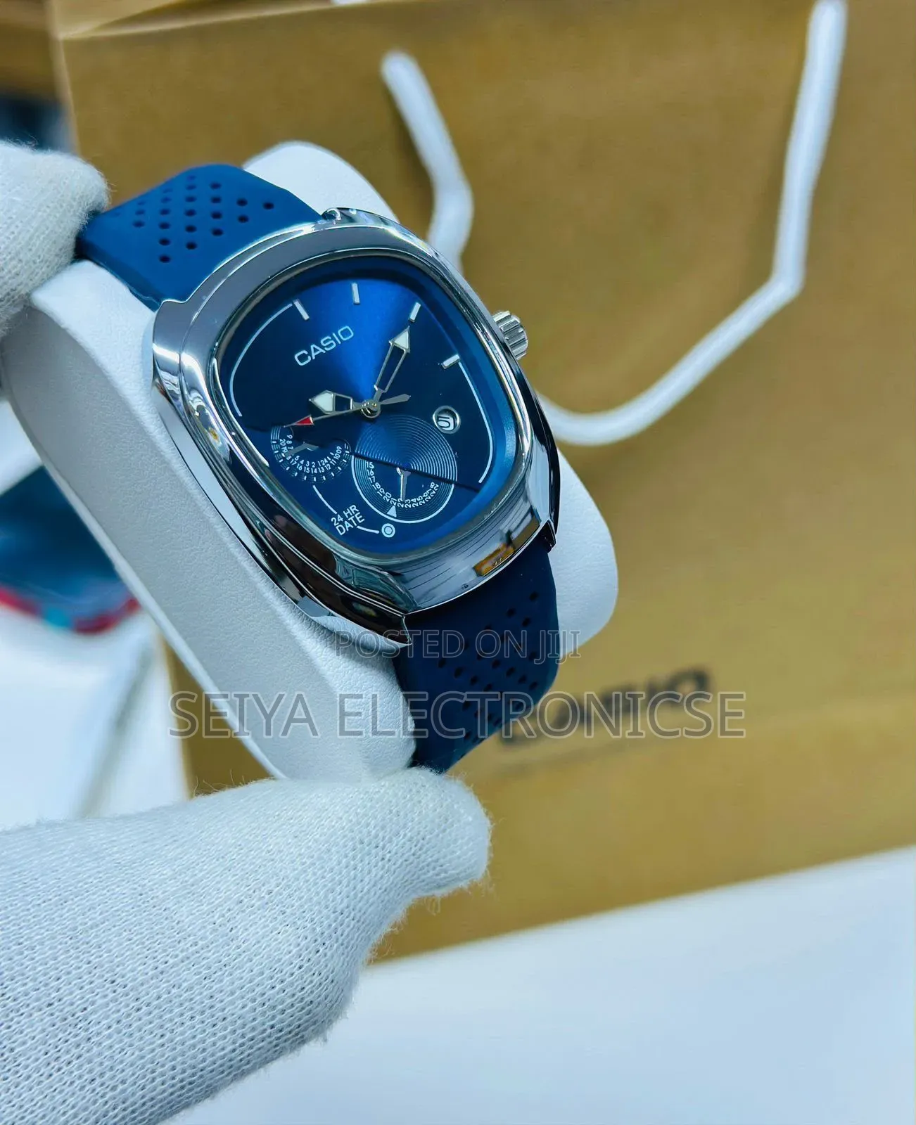 Casio Analog Watch Blue Dial and a Blue Perforated Strap.