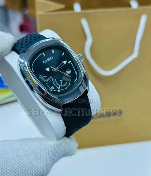 Casio Analog Watch Blue Dial and a Blue Perforated Strap.