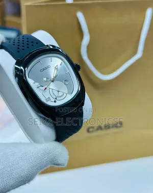Casio Analog Watch Blue Dial and a Blue Perforated Strap.
