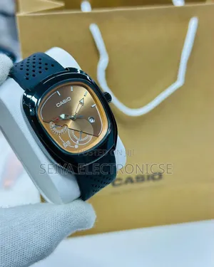 Casio Analog Watch Blue Dial and a Blue Perforated Strap.