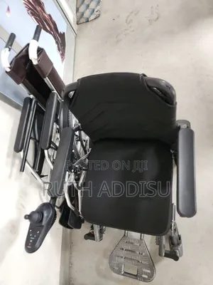 Electrical Foldable Electric Wheelchair, Often Featuring a Light