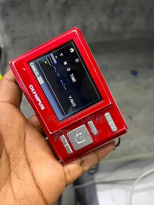  Olympus T-100
Digital Camera