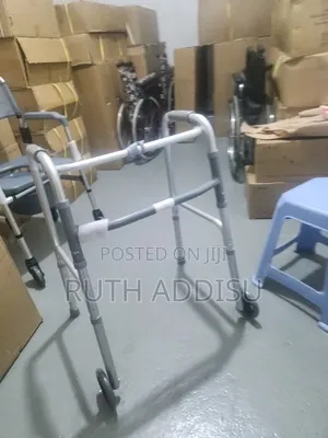 Drive Medical Two-Button Folding Walker With Wheels Ethiopial Walker