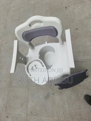 Commode Chair | Height Adjustable | Padded Seat and Backrest Toilet