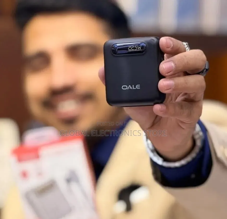 Super Fast Charging Wireless Power Bank With Cable Attach on It