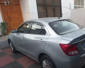 Suzuki Dzire 2024 Maroon