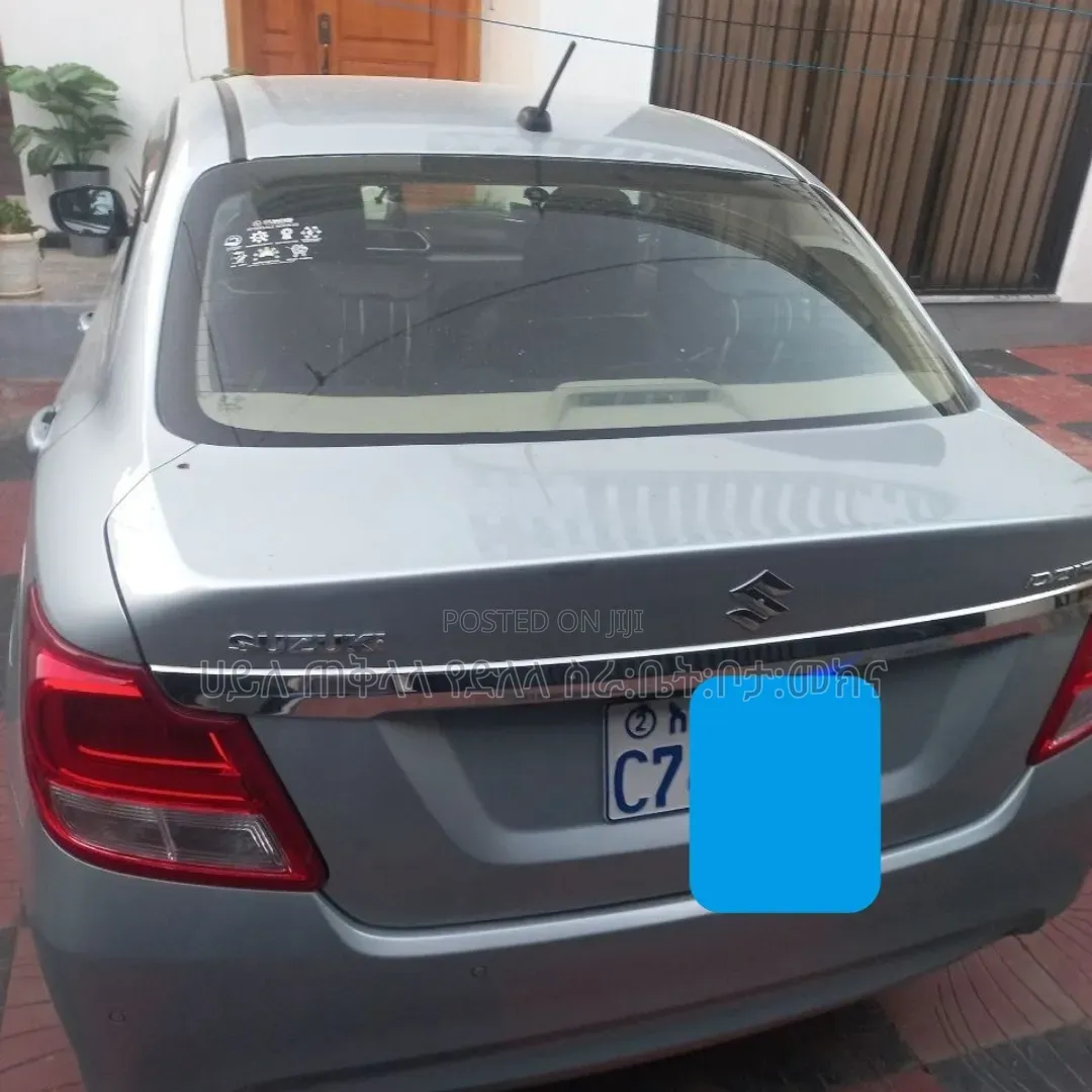 Suzuki Dzire 2024 Maroon