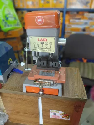 Key Cutting Machine ( ቁልፍ መቅረጫ ማሽን)