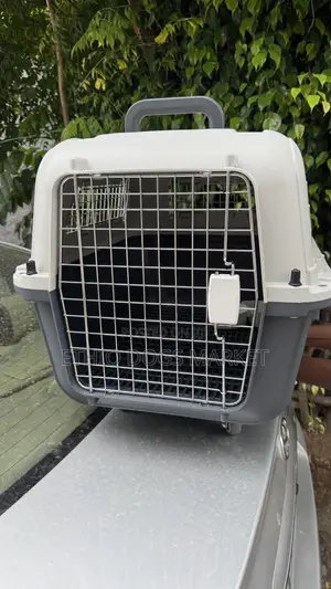 ዉሻ ማጉዋጉዣ Travel Cage