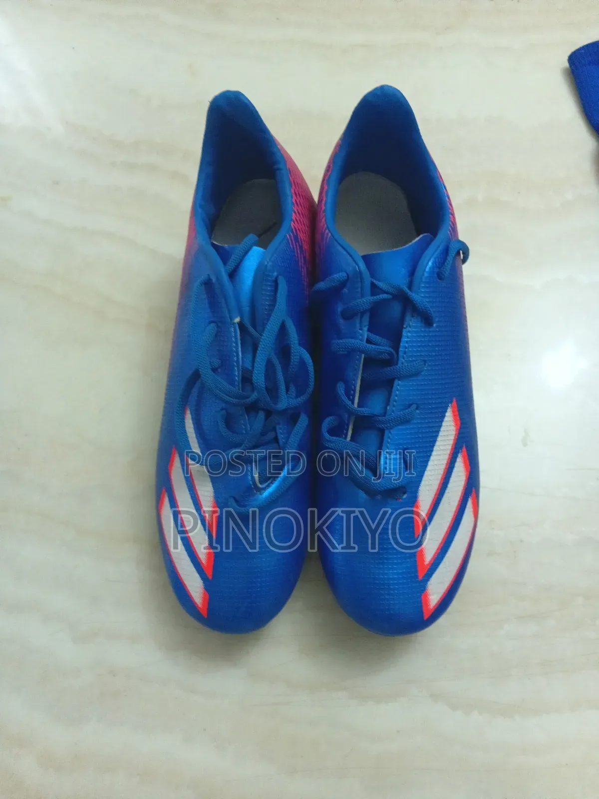 Sport Shoe/ታኬታ